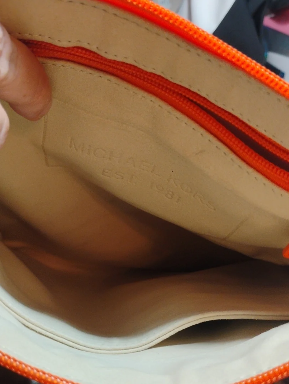 Michael Kors Neoprene Tangerine Mono Embossed Swing Crossbody bag